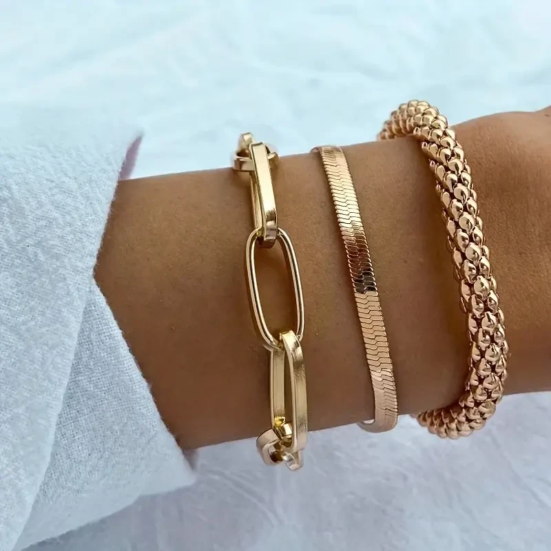 Pulsera de cadena con hueso de serpiente dorado de inspiración vintage