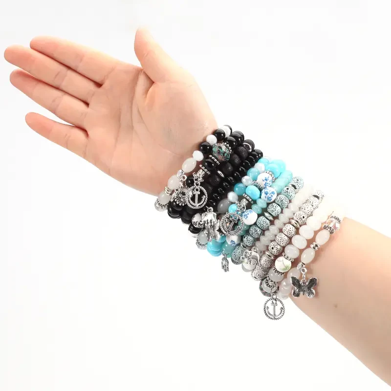 Pulsera de cuentas bohemia con dijes de elefante, ancla y mariposa - Pulsera de cuentas bohemia con dijes de ancla y mariposa -