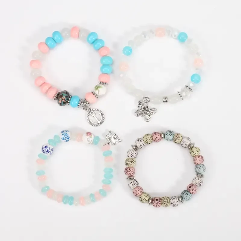 Pulsera de cuentas bohemia con dijes de elefante, ancla y mariposa - Pulsera de cuentas bohemia con dijes de ancla y mariposa -