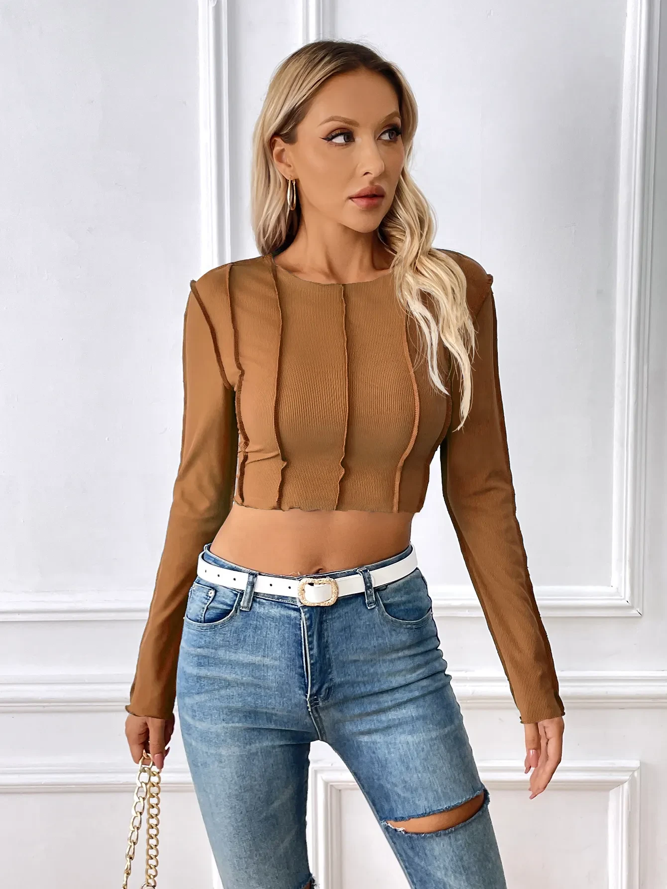 Nueva camiseta de manga larga ajustada con costuras expuestas, diseño Y2K, top corto sexy con el ombligo al descubierto, ropa para mujer