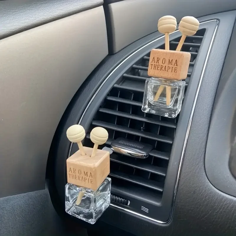 2 botellas de perfume para salida de aire del coche