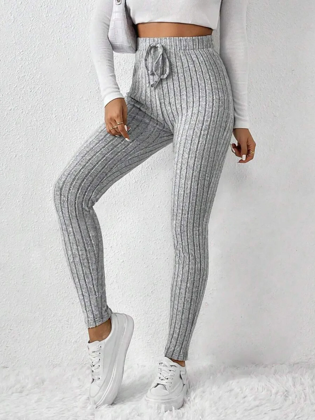 Pantalones de yoga sin costuras que levantan la cadera y son transpirables.