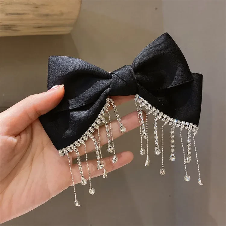 Accesorios para el cabello con borlas negras y diamantes de imitación en la parte posterior