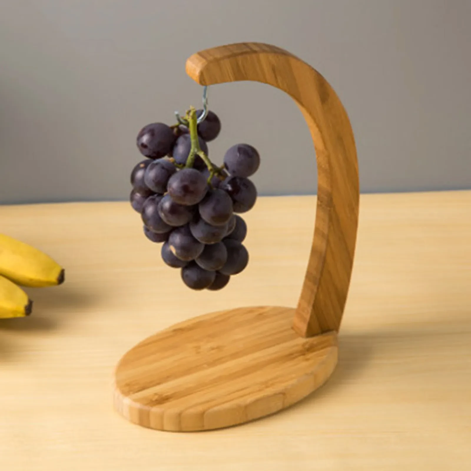 Estante de almacenamiento de frutas de bambú tipo plátano para organizar el almacenamientoEstante de almacenamiento de frutas de bambú tipo plátano para organizar el almacenamiento