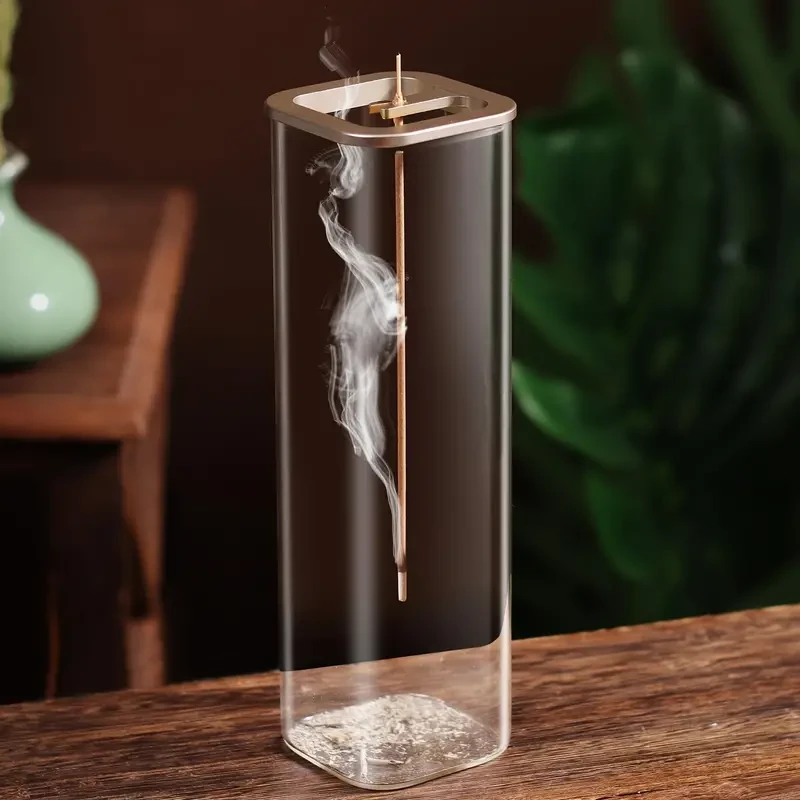 Porta incienso de vidrio con base de metal: ideal para meditación, yoga y decoración del hogar.