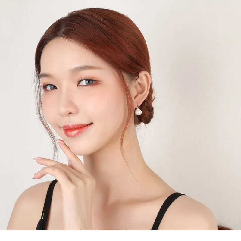 Pendientes elegantes de perla con forma de gota de agua para mujer