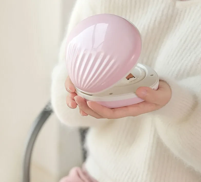 Luz de proyección de arcoíris de concha