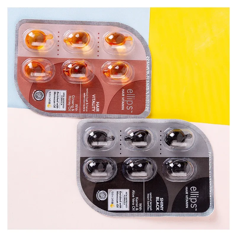 Caja de aceites esenciales para el cuidado del cabello con vitaminas