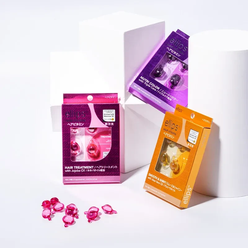 Caja de aceites esenciales para el cuidado del cabello con vitaminas