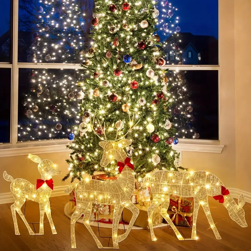 Encantadora decoración iluminada de familia de renos de cristal blanco. Funciona con pilas, luces intermitentes para Navidad y Halloween en exteriores.