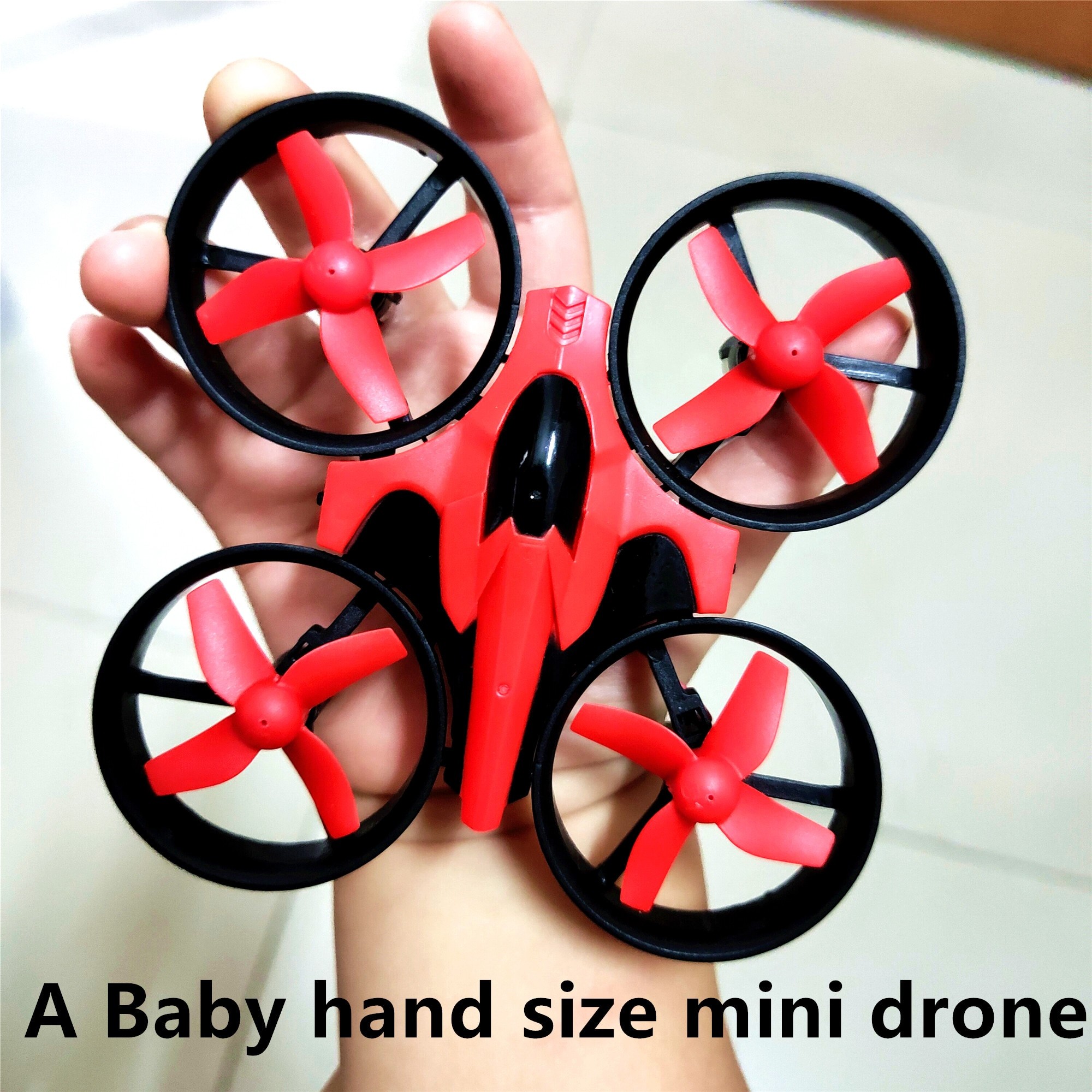Mini cuadricóptero de control remoto con anillo protector, dron de control remoto anticaída, avión de control remoto, juguete para niños