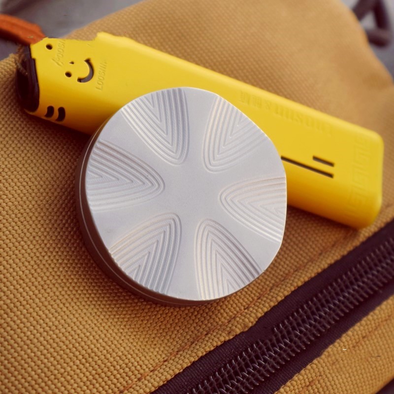 Juguete giratorio de acero inoxidable con forma de moneda pop, regalo de alta tecnología.