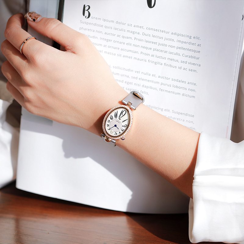 Reloj ovalado de estilo generoso, elegante y retro con forma de gota para mujer