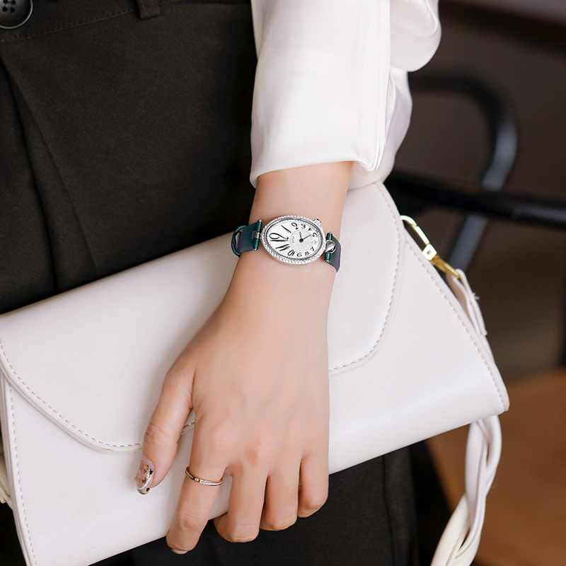 Reloj ovalado de estilo generoso, elegante y retro con forma de gota para mujer