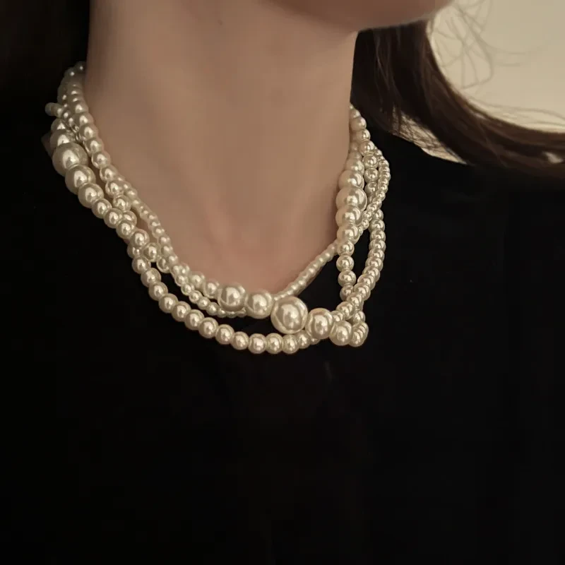 Collar de perlas multicapa estilo retro francés, ligero, lujoso, de gran sentido y con un diseño especial.
