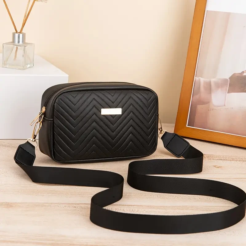 Elegante bolso bandolera acolchado