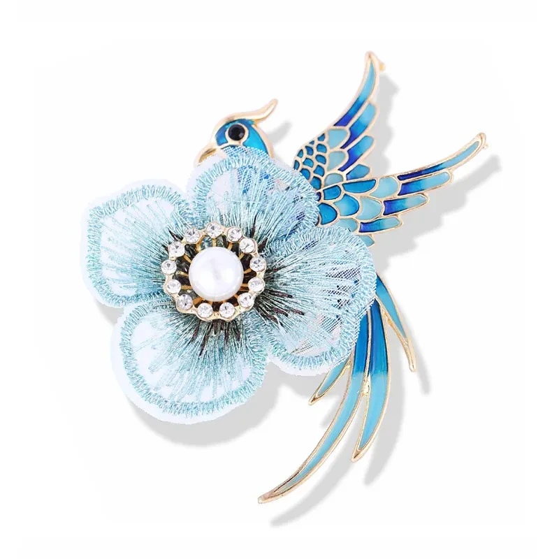 Broche bordado con forma de ave fénix