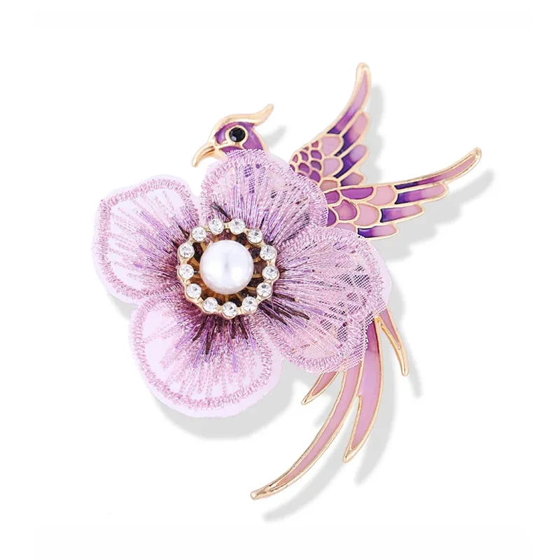 Broche bordado con forma de ave fénix