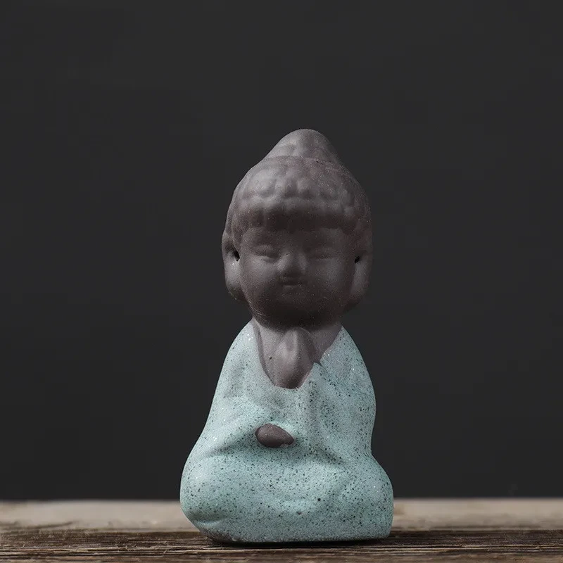 Cuatro pequeñas mascotas de té de los monjes Zesha