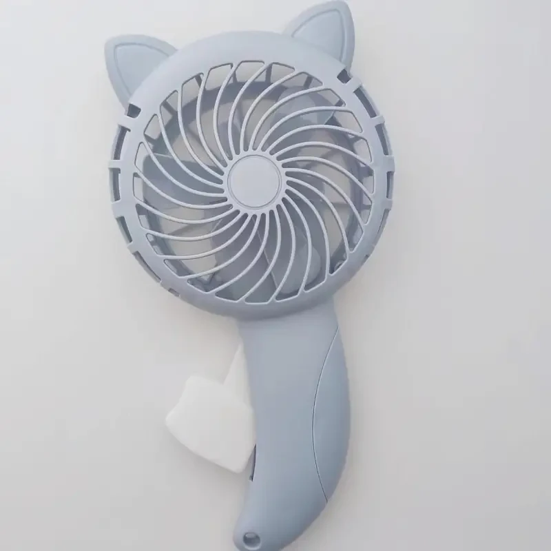 Lindo ventilador de mano de dibujos animados