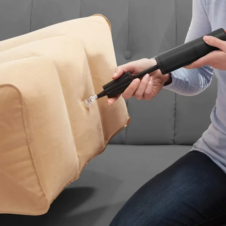 Almohada inflable de viaje para las piernas