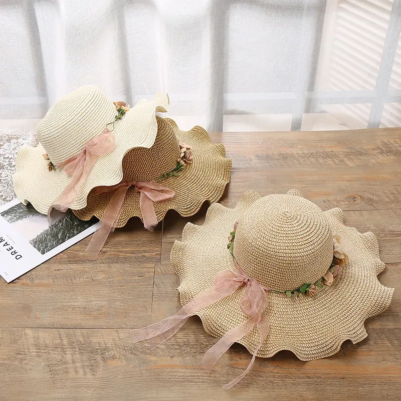 Sombrero de paja con borde ondulado y flores para mujer, sombrero de playa grande y soleado, de moda, para verano