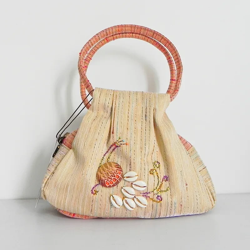Bolso tejido de pavo real