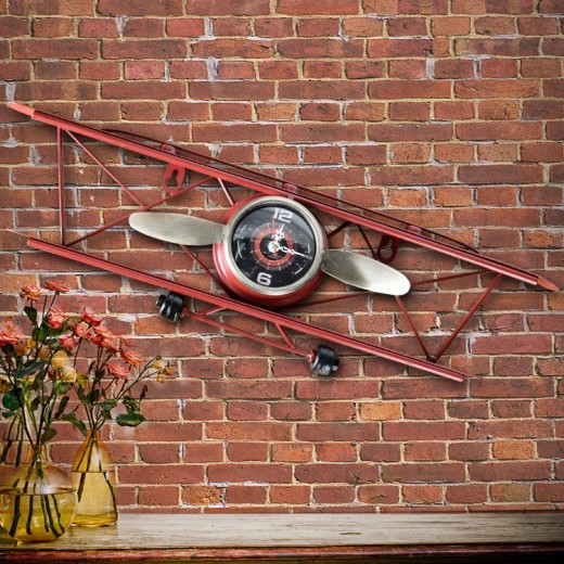 Reloj de pared vintage de hierro forjado con diseño de avión