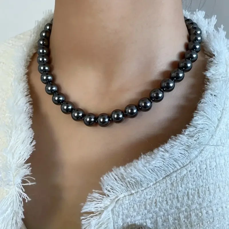 Elegante conjunto de joyas de perla negra para mujer: collar y pendientes de inspiración vintage, perfectos para bodas y ocasiones especiales.