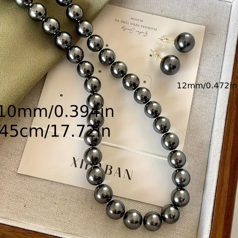 Elegante conjunto de joyas de perla negra para mujer: collar y pendientes de inspiración vintage, perfectos para bodas y ocasiones especiales.