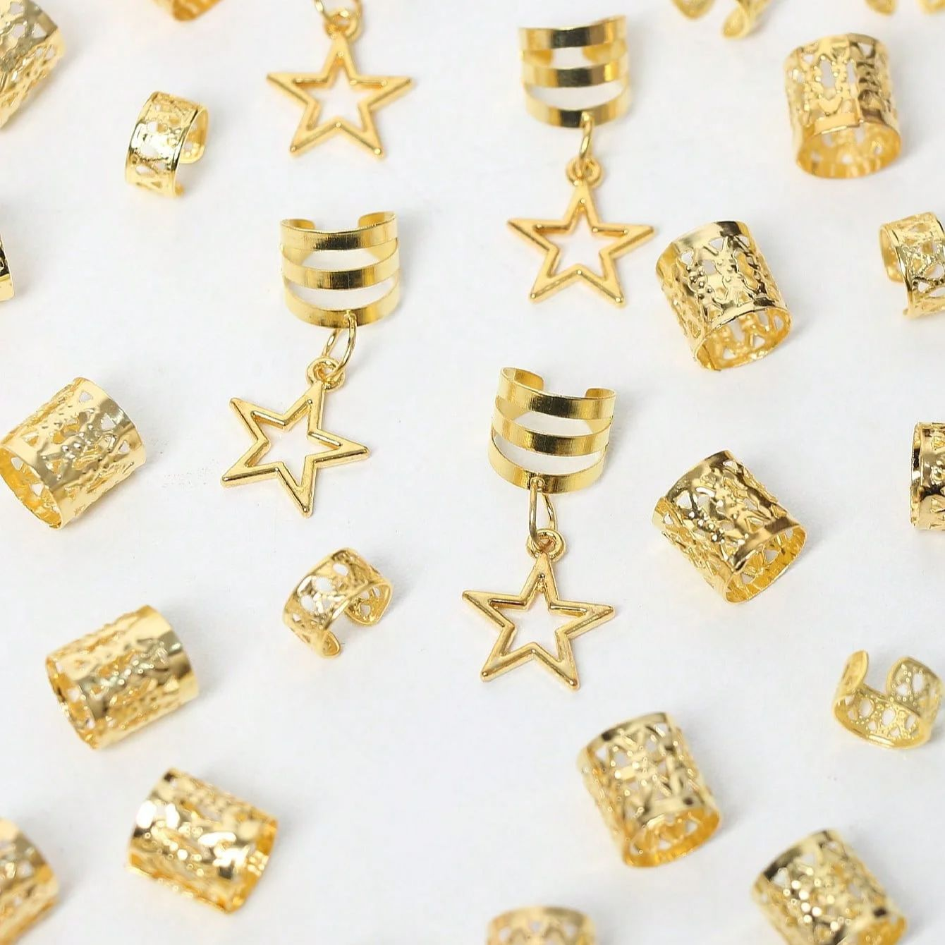 36 anillas de estrella para el pelo, pinzas para trenzas, puños para rastas y accesorios metálicos para el pelo.