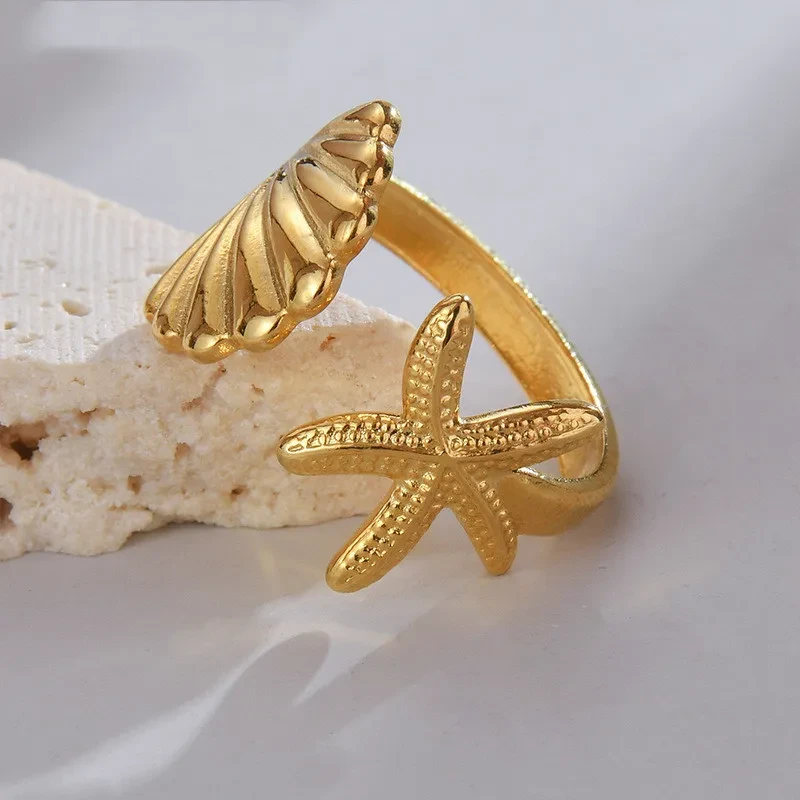 Anillo de concha de acero y titanio