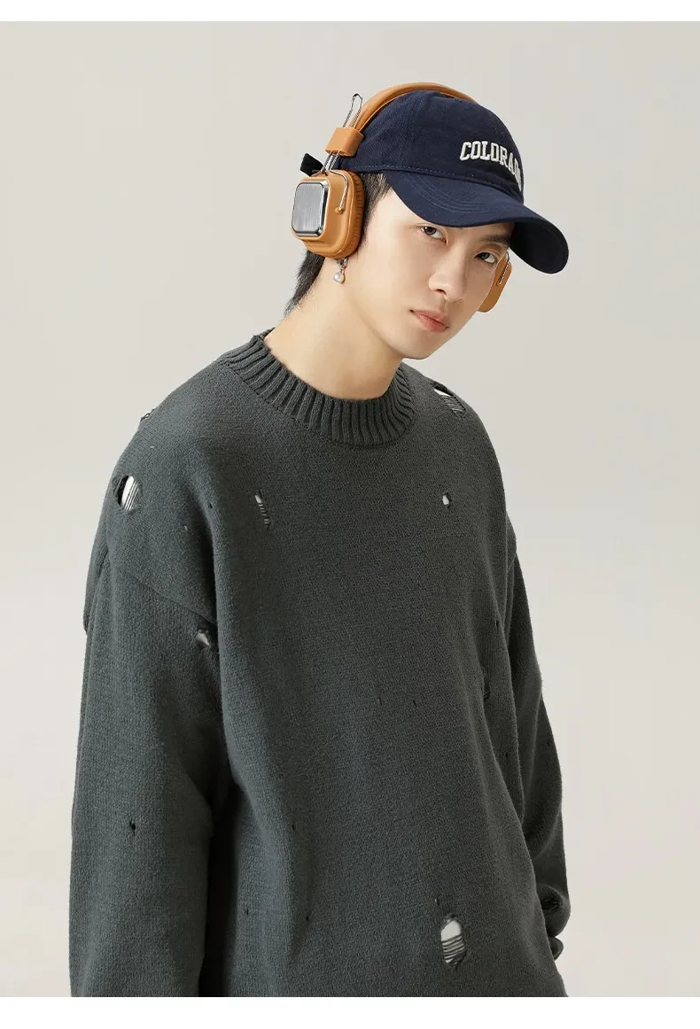 Suéter de terciopelo de chenilla rasgado con agujeros irregulares