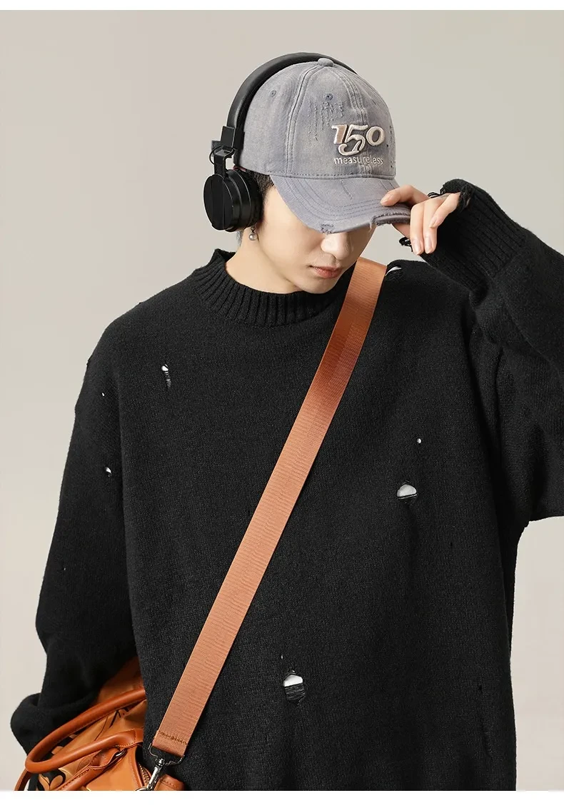 Suéter de terciopelo de chenilla rasgado con agujeros irregulares