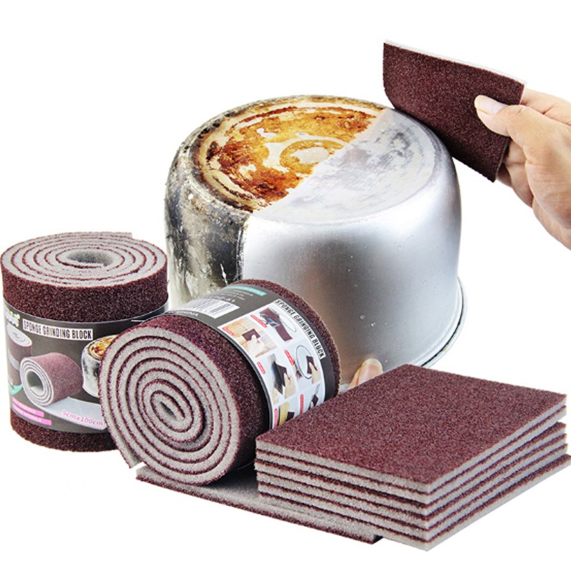 Esponja mágica de melamina y carborundo para fregar ollas, sartenes y utensilios de cocina.