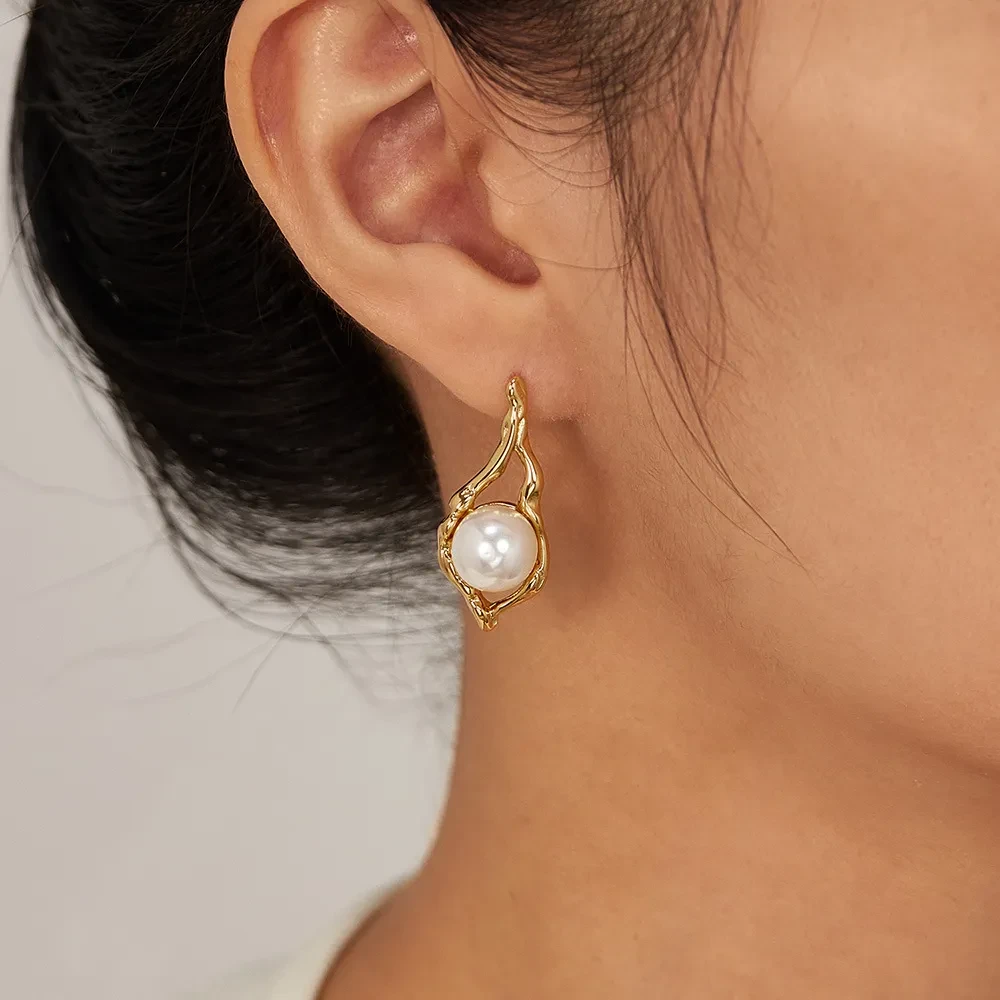 Pendientes de acero inoxidable con perla geométrica y temperamento lujoso de entrada europea y americana