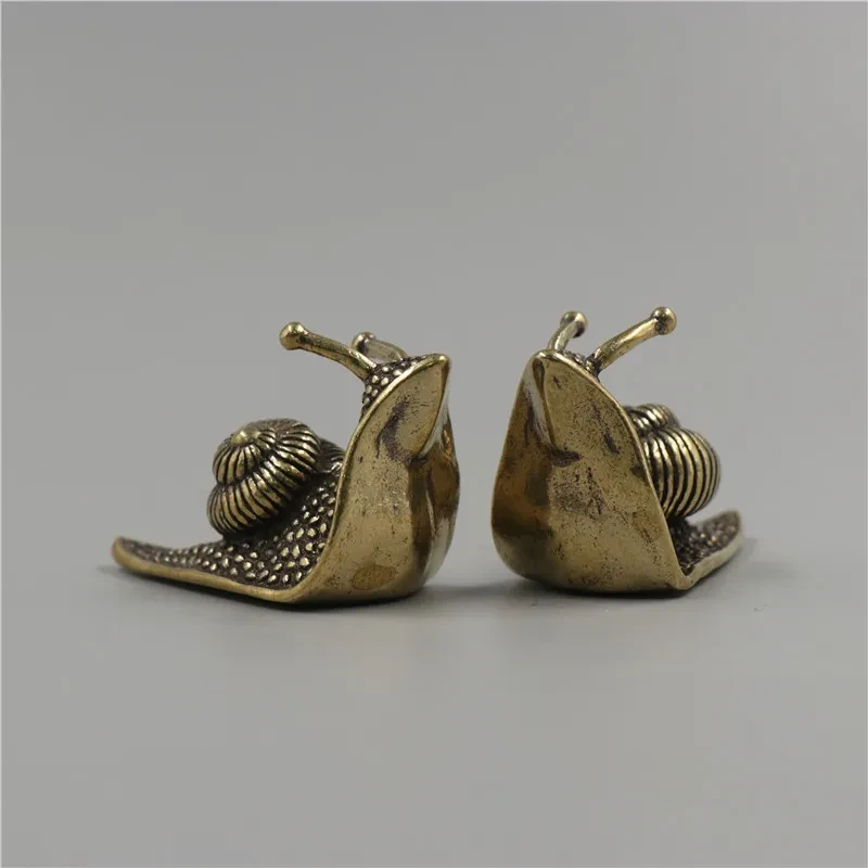 Caracol de mascota de té de latón