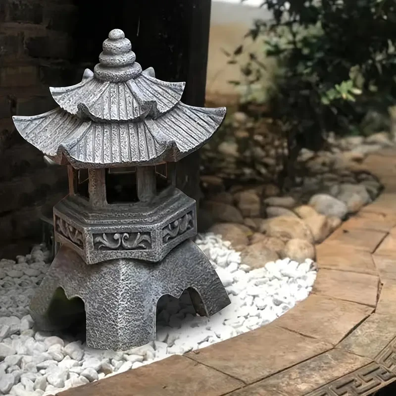 Estatua de linterna de pagoda zen alimentada por energía solar