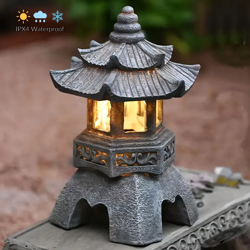 Estatua de linterna de pagoda zen alimentada por energía solar