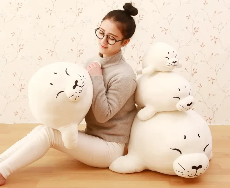 Juguete de peluche con forma de almohada de foca