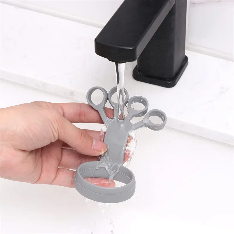 Dispositivo de agarre de silicona para ejercicios con los dedos