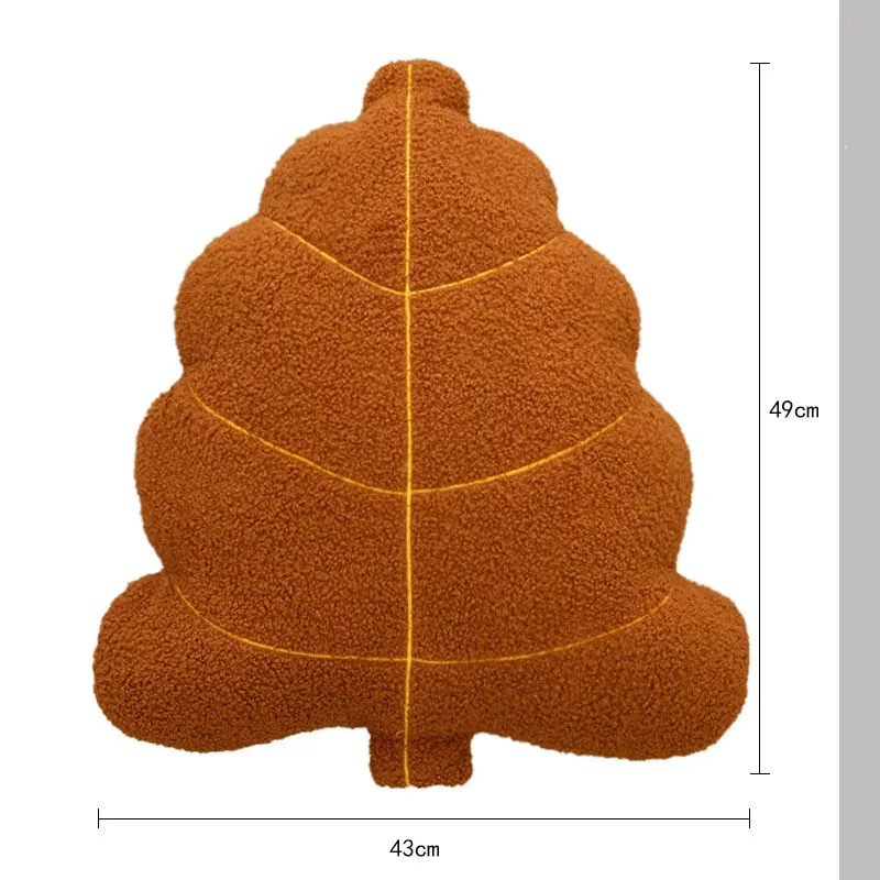 Decoración de sofá con almohada en forma de hoja