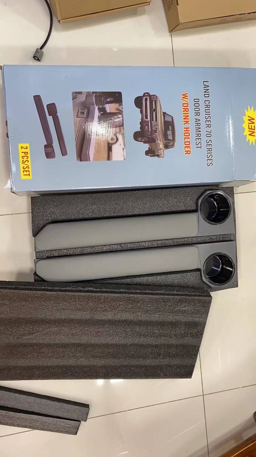 Marco del anillo de la puerta del reposabrazos del automóvil