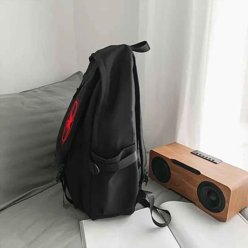 Mochila de nailon moderna para niño: informal, de gran capacidad y con correas ajustables para uso en exteriores y en el campus, color negro.