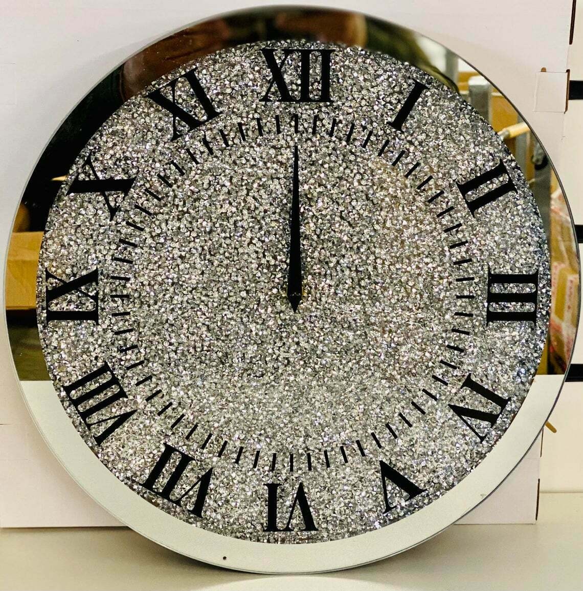 Reloj de pared grande con espejo de cristal y plata brillante