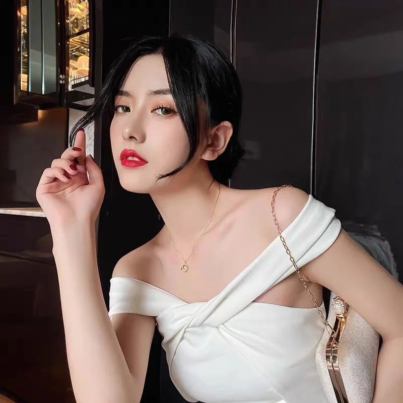 Collar con colgante de cruz giratoria de plata de ley 925