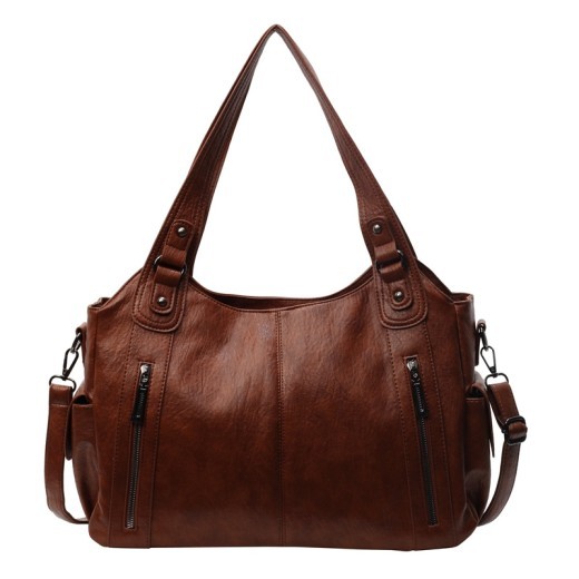 Bolso bandolera a juego para viajes de corta distancia.