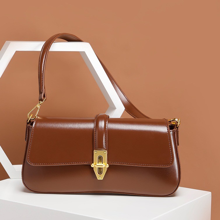 Bolso bandolera de piel para mujer con textura avanzada y diseño baguette salvaje en la axila