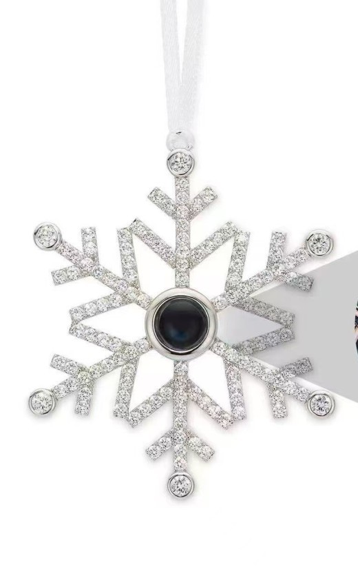 Colgante de copo de nieve con proyección de regalo de Navidad