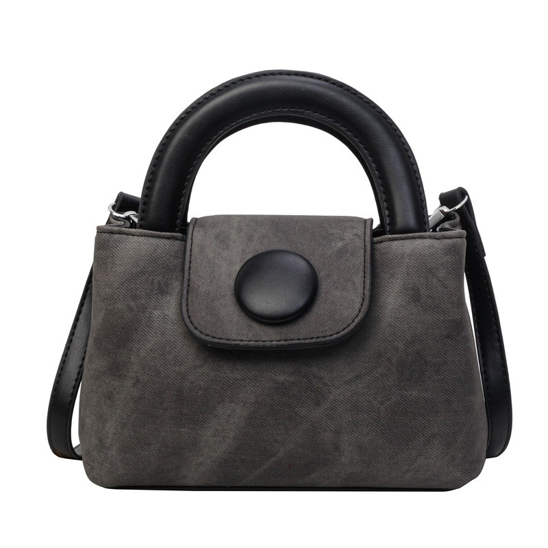 Bolso de mano femenino, compacto y bonito, con un diseño de contraste de colores.